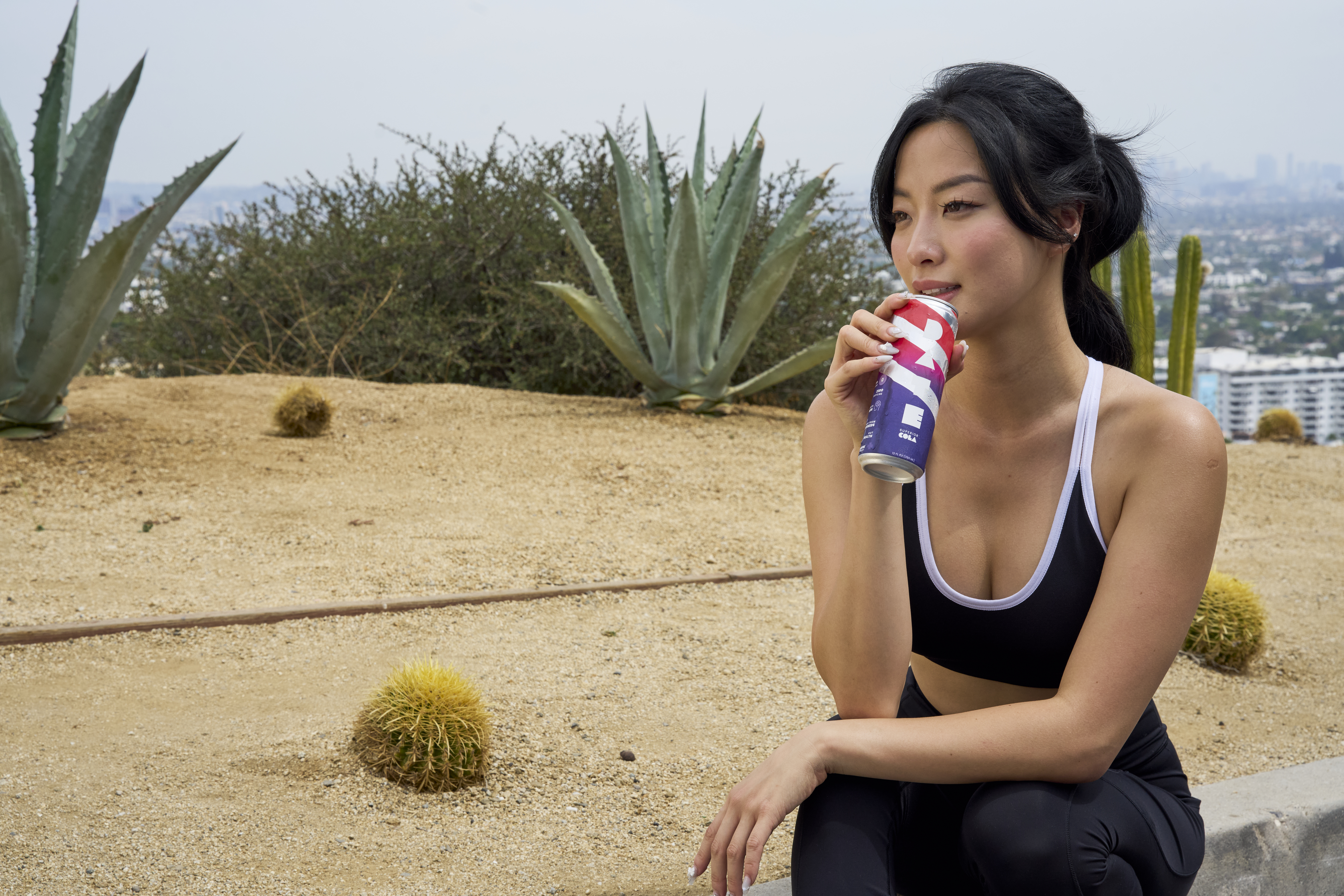 Woman enjoying DATE Superior Cola